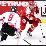 Ljungby 2012-02-17 Ishockey HockeyAllsvenskan IF Troja-Ljungby - Örebro: Troja Ljungby forward 52 Mikael AhlÃ©n störtar mot mål.